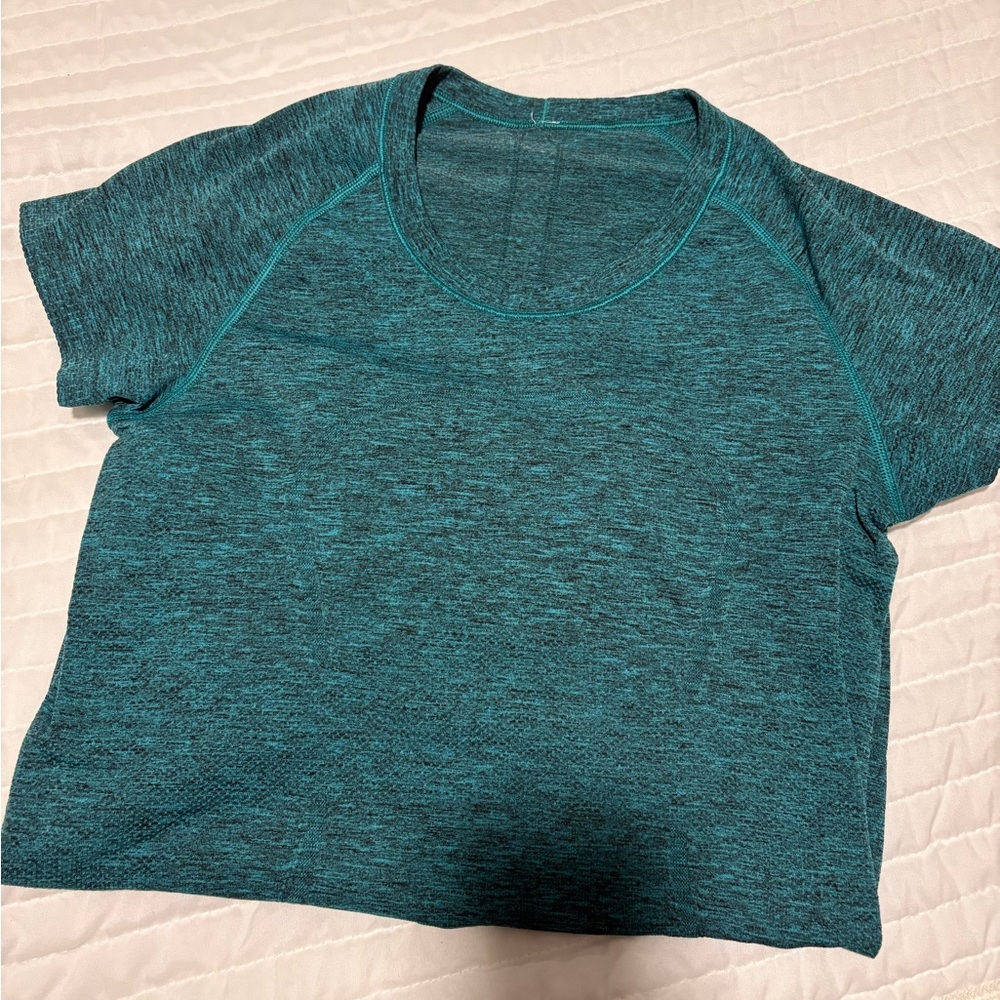 Lululemon Swiftly Tech teal top size 4